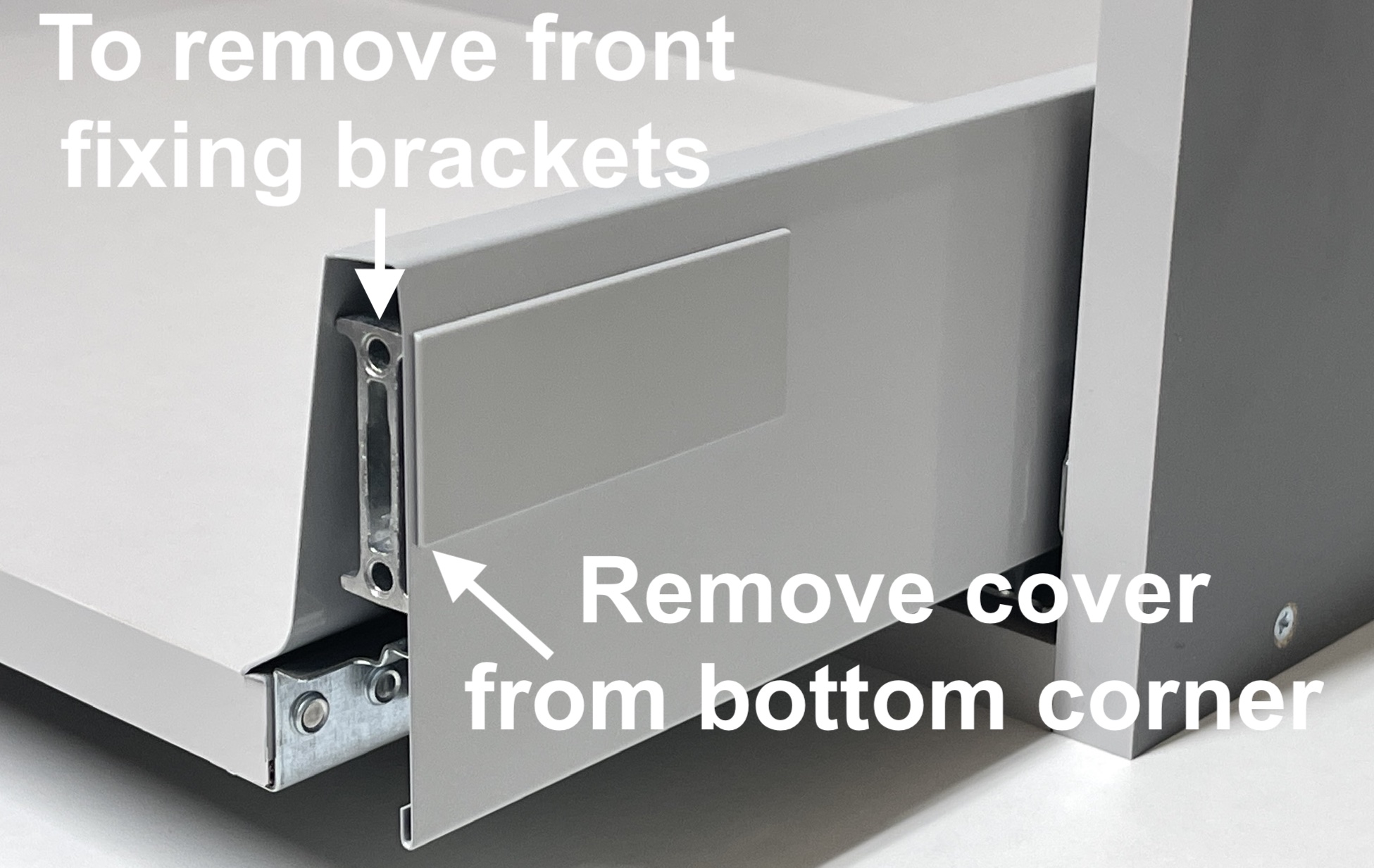 Remove cover cap from Blum drawer side